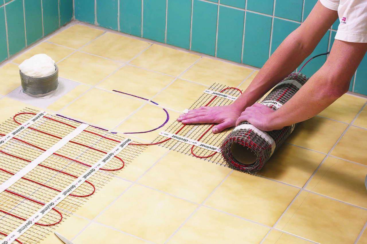 Как сделать теплый пол в ванной - водяной, электрический или инфракрасный
